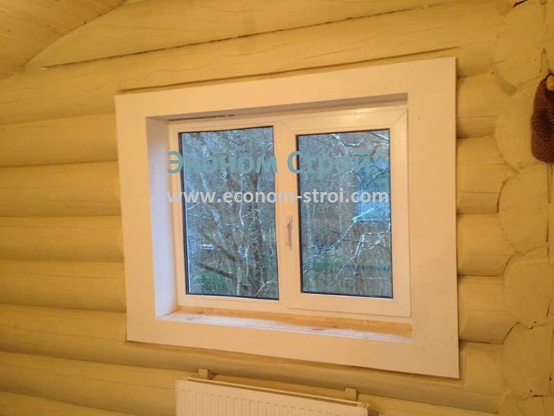 фото отделки окон дома из бревна